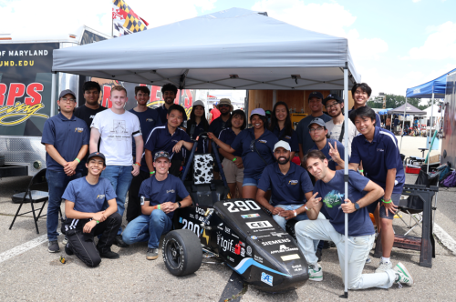 Team picture with FE11 at the team paddock