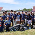 Team picture with FE11 on the Michigan International Speedway